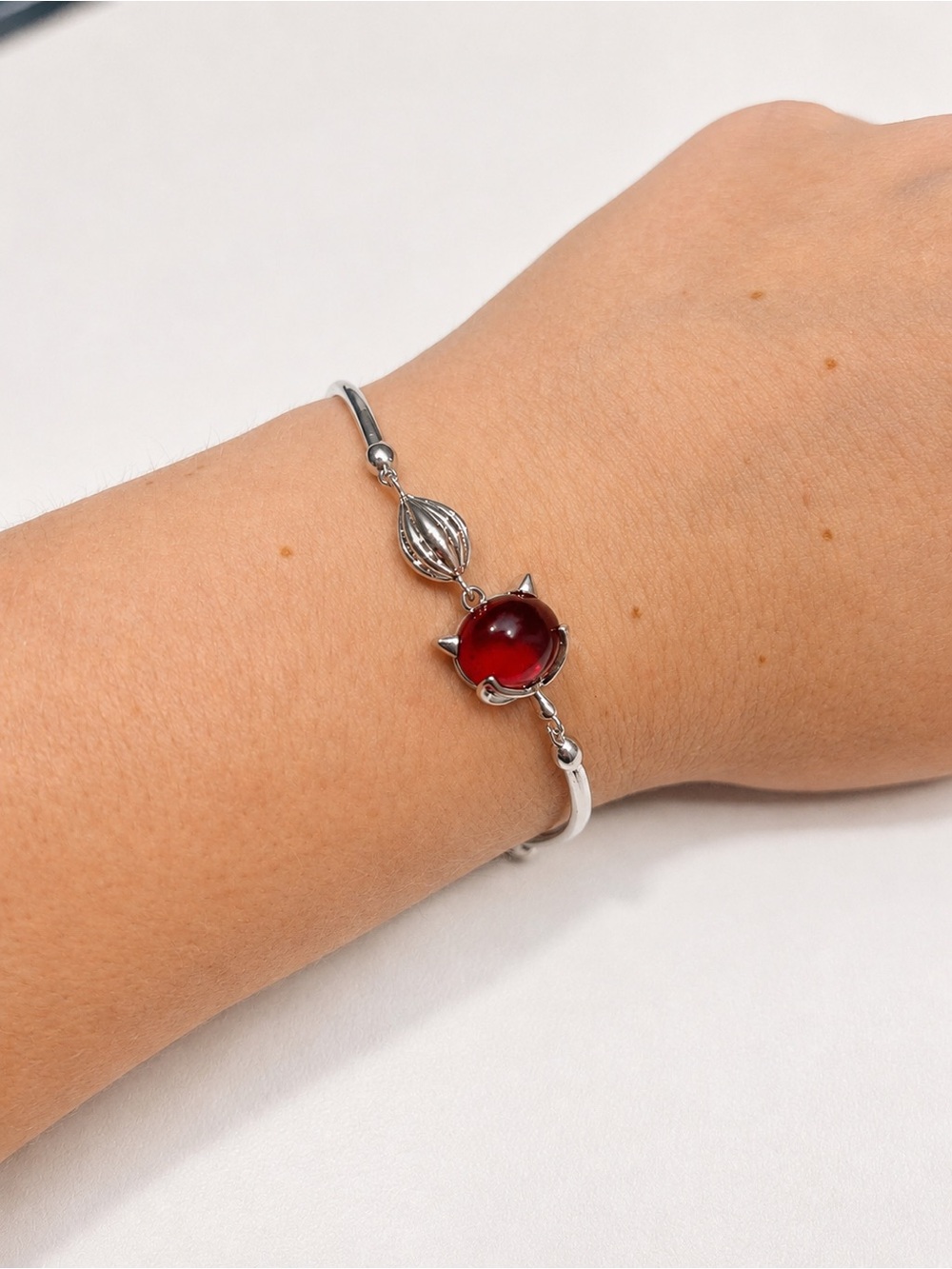 Silver Bracelet with Red Charm
